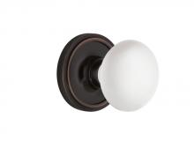 Nostalgic Warehouse 700230 - Nostalgic Warehouse Classic Rosette Passage White Porcelain Door Knob in Timeless Bronze