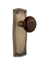 Nostalgic Warehouse 705744 - Nostalgic Warehouse Prairie Plate Privacy Brown Porcelain Door Knob in Antique Brass