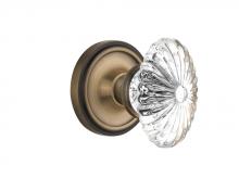 Nostalgic Warehouse 708446 - Nostalgic Warehouse Classic Rosette Passage Oval Fluted Crystal Glass Door Knob in Antique Brass