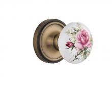 Nostalgic Warehouse 710880 - Nostalgic Warehouse Classic Rosette Passage White Rose Porcelain Door Knob in Antique Brass