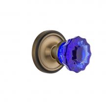 Nostalgic Warehouse 722115 - Nostalgic Warehouse Classic Rosette Single Dummy Crystal Cobalt Glass Door Knob in Antique Brass